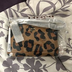 Coach leopard print wristlet